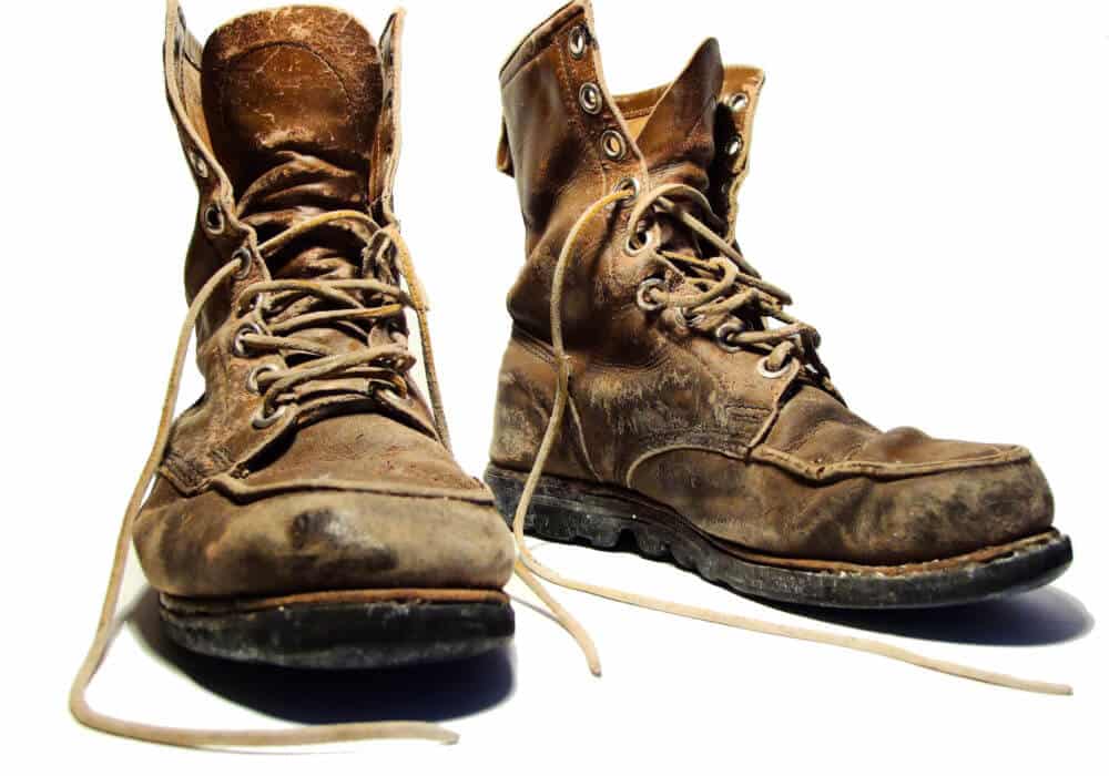 worn but durable work boots