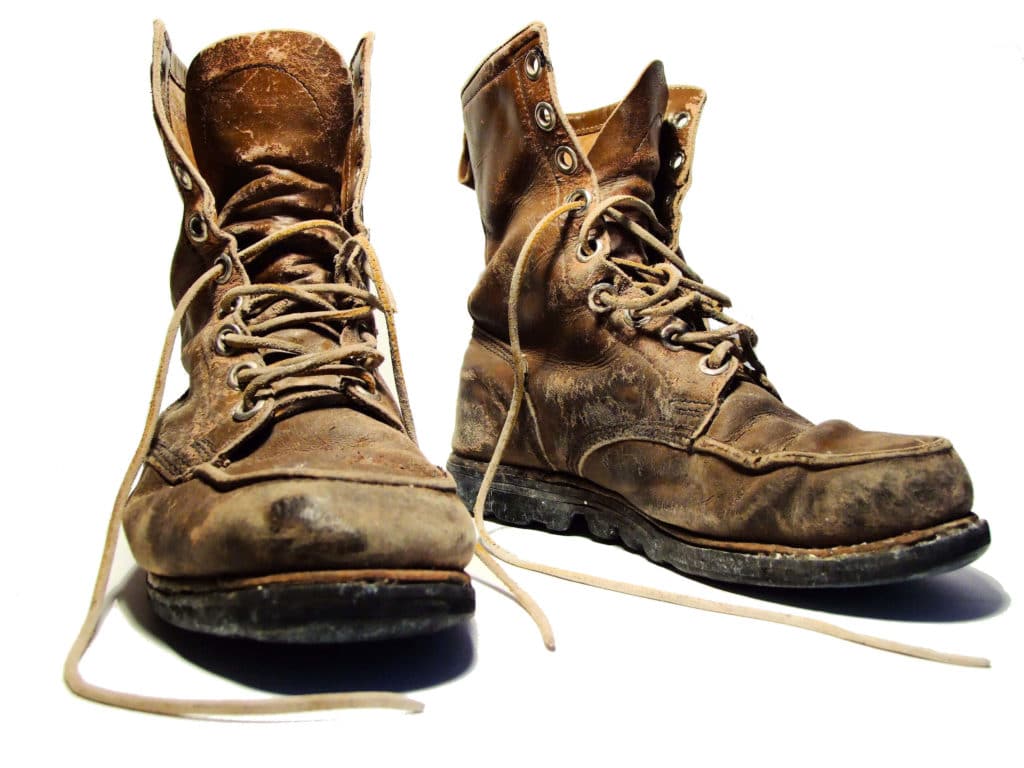 worn but durable work boots