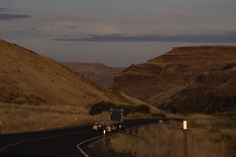 flat bed truck on highway