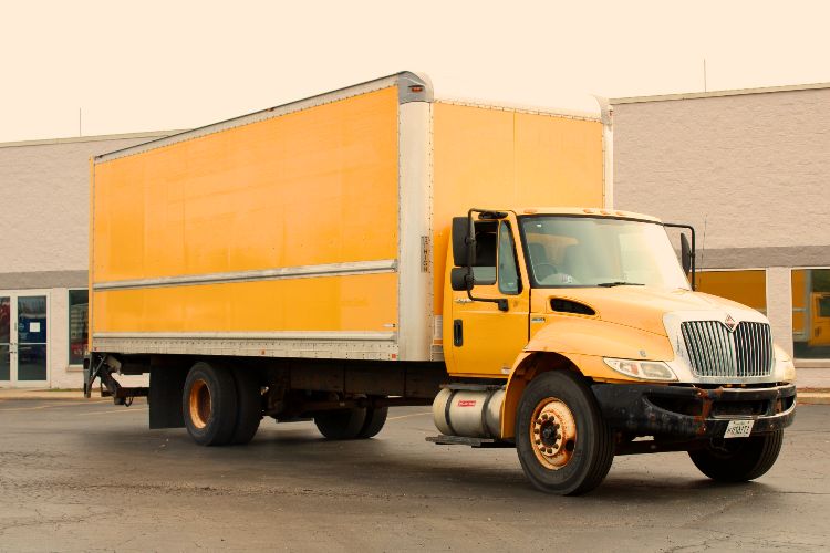 mustard yellow box truck