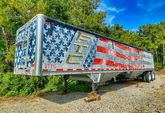 tractor trailer with faded american flag