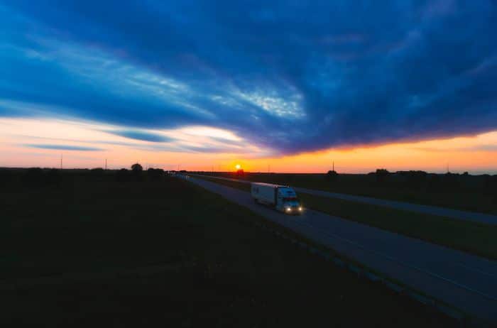 semi truck on the highway at night