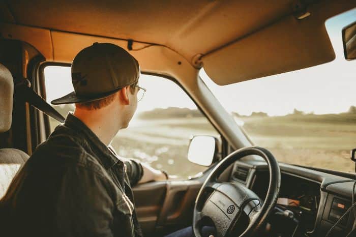 young man in truck