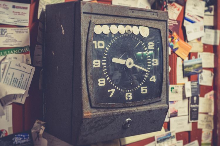 punch card clock on wall