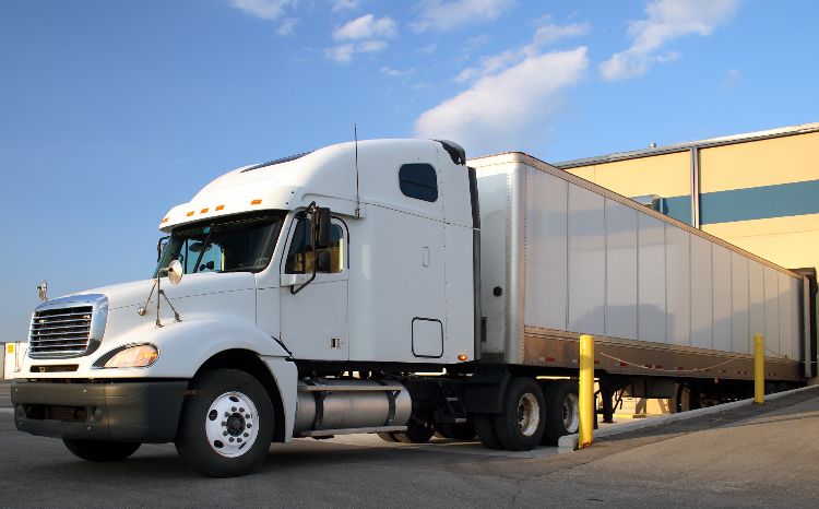 tractor trailer truck at loading dock